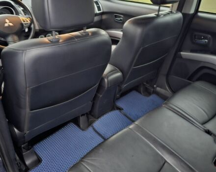 Синий Мицубиси Аутлендер ХЛ, объемом двигателя 2.4 л и пробегом 282 тыс. км за 9500 $, фото 7 на Automoto.ua