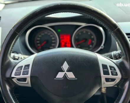 Синий Мицубиси Аутлендер ХЛ, объемом двигателя 2.4 л и пробегом 215 тыс. км за 9290 $, фото 24 на Automoto.ua