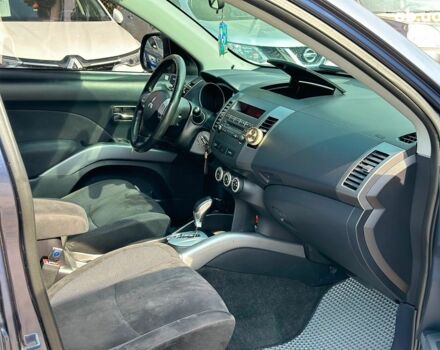 Синий Мицубиси Аутлендер ХЛ, объемом двигателя 2.4 л и пробегом 215 тыс. км за 9290 $, фото 15 на Automoto.ua