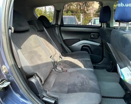 Синий Мицубиси Аутлендер ХЛ, объемом двигателя 2.4 л и пробегом 215 тыс. км за 9290 $, фото 14 на Automoto.ua