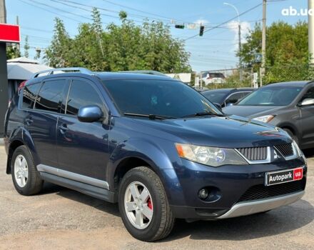 Синий Мицубиси Аутлендер ХЛ, объемом двигателя 2.4 л и пробегом 215 тыс. км за 9290 $, фото 4 на Automoto.ua