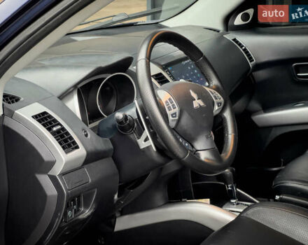 Синий Мицубиси Аутлендер ХЛ, объемом двигателя 2.4 л и пробегом 249 тыс. км за 8800 $, фото 14 на Automoto.ua