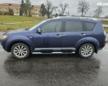 Синий Мицубиси Аутлендер ХЛ, объемом двигателя 2.4 л и пробегом 282 тыс. км за 9500 $, фото 5 на Automoto.ua