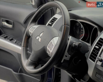 Синий Мицубиси Аутлендер ХЛ, объемом двигателя 2.4 л и пробегом 249 тыс. км за 8800 $, фото 21 на Automoto.ua