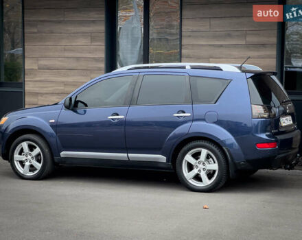 Синий Мицубиси Аутлендер ХЛ, объемом двигателя 2.4 л и пробегом 249 тыс. км за 8800 $, фото 6 на Automoto.ua