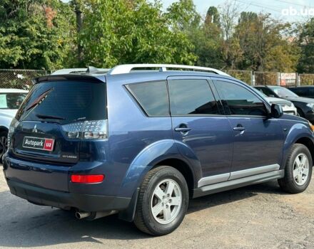 Синий Мицубиси Аутлендер ХЛ, объемом двигателя 2.4 л и пробегом 215 тыс. км за 9290 $, фото 6 на Automoto.ua