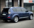 Синий Мицубиси Аутлендер ХЛ, объемом двигателя 2.4 л и пробегом 249 тыс. км за 8800 $, фото 10 на Automoto.ua
