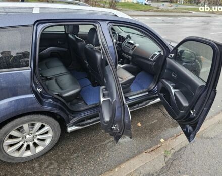 Синий Мицубиси Аутлендер ХЛ, объемом двигателя 2.4 л и пробегом 282 тыс. км за 9500 $, фото 10 на Automoto.ua