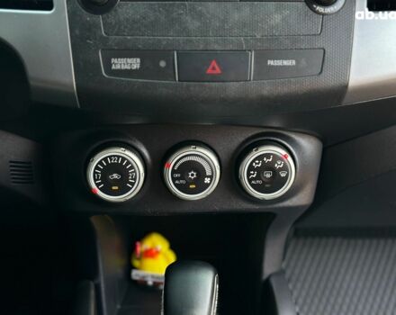 Синий Мицубиси Аутлендер ХЛ, объемом двигателя 2.4 л и пробегом 215 тыс. км за 9290 $, фото 19 на Automoto.ua