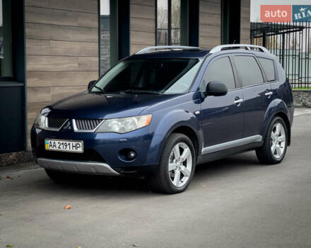 Синий Мицубиси Аутлендер ХЛ, объемом двигателя 2.4 л и пробегом 249 тыс. км за 8800 $, фото 2 на Automoto.ua