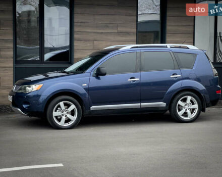 Синий Мицубиси Аутлендер ХЛ, объемом двигателя 2.4 л и пробегом 249 тыс. км за 8800 $, фото 4 на Automoto.ua