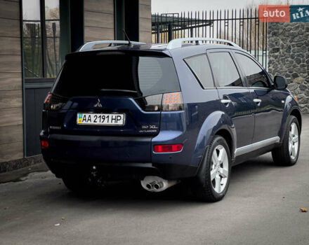 Синий Мицубиси Аутлендер ХЛ, объемом двигателя 2.4 л и пробегом 249 тыс. км за 8800 $, фото 9 на Automoto.ua