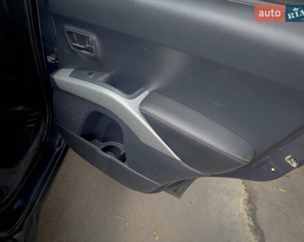 Синий Мицубиси Аутлендер ХЛ, объемом двигателя 2.4 л и пробегом 249 тыс. км за 8800 $, фото 19 на Automoto.ua