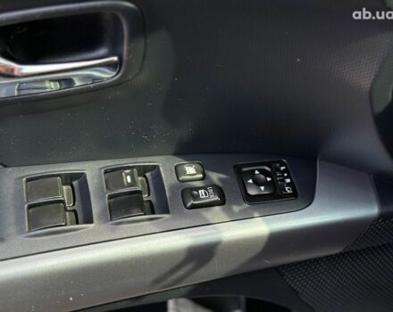 Синий Мицубиси Аутлендер ХЛ, объемом двигателя 2.4 л и пробегом 215 тыс. км за 9290 $, фото 26 на Automoto.ua