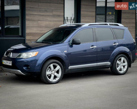 Синий Мицубиси Аутлендер ХЛ, объемом двигателя 2.4 л и пробегом 249 тыс. км за 8800 $, фото 3 на Automoto.ua