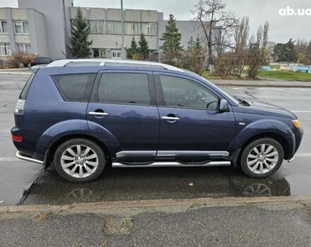 Синий Мицубиси Аутлендер ХЛ, объемом двигателя 2.4 л и пробегом 282 тыс. км за 9500 $, фото 2 на Automoto.ua