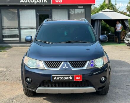 Синий Мицубиси Аутлендер ХЛ, объемом двигателя 2.4 л и пробегом 215 тыс. км за 9290 $, фото 3 на Automoto.ua