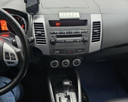 Синий Мицубиси Аутлендер ХЛ, объемом двигателя 2.4 л и пробегом 282 тыс. км за 9500 $, фото 11 на Automoto.ua