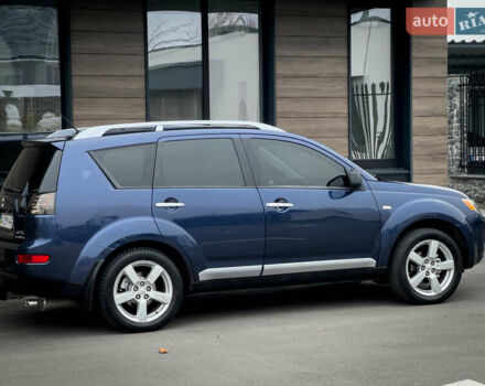 Синий Мицубиси Аутлендер ХЛ, объемом двигателя 2.4 л и пробегом 249 тыс. км за 8800 $, фото 11 на Automoto.ua