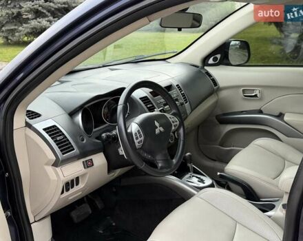 Синий Мицубиси Аутлендер ХЛ, объемом двигателя 3 л и пробегом 180 тыс. км за 9900 $, фото 23 на Automoto.ua