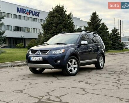 Синий Мицубиси Аутлендер ХЛ, объемом двигателя 3 л и пробегом 180 тыс. км за 9900 $, фото 1 на Automoto.ua