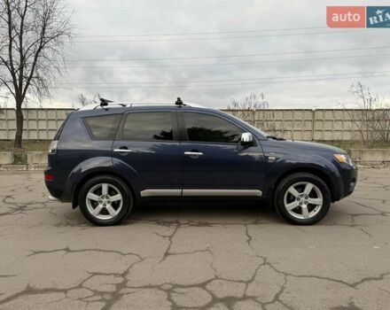 Синий Мицубиси Аутлендер ХЛ, объемом двигателя 3 л и пробегом 180 тыс. км за 9900 $, фото 4 на Automoto.ua