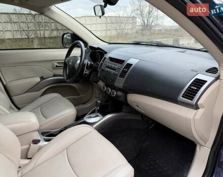 Синий Мицубиси Аутлендер ХЛ, объемом двигателя 3 л и пробегом 180 тыс. км за 9900 $, фото 18 на Automoto.ua