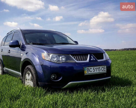 Синій Міцубісі Аутлендер ХЛ, об'ємом двигуна 2.4 л та пробігом 295 тис. км за 7600 $, фото 1 на Automoto.ua