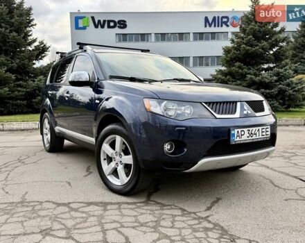Синий Мицубиси Аутлендер ХЛ, объемом двигателя 3 л и пробегом 180 тыс. км за 9900 $, фото 1 на Automoto.ua