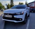 Білий Міцубісі Аутлендер, об'ємом двигуна 2.4 л та пробігом 133 тис. км за 13900 $, фото 1 на Automoto.ua