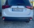 Белый Мицубиси Аутлендер, объемом двигателя 2.4 л и пробегом 150 тыс. км за 16000 $, фото 1 на Automoto.ua