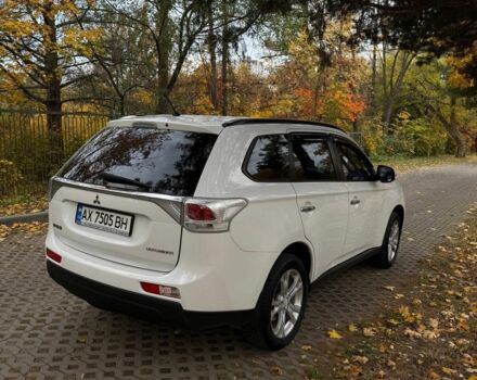 Белый Мицубиси Аутлендер, объемом двигателя 2.4 л и пробегом 146 тыс. км за 13500 $, фото 1 на Automoto.ua