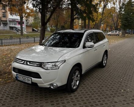 Белый Мицубиси Аутлендер, объемом двигателя 2.4 л и пробегом 146 тыс. км за 13500 $, фото 2 на Automoto.ua