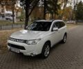 Белый Мицубиси Аутлендер, объемом двигателя 2.4 л и пробегом 146 тыс. км за 13500 $, фото 2 на Automoto.ua