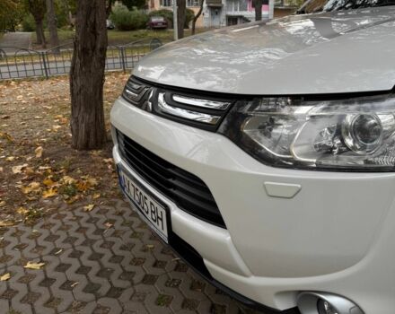 Белый Мицубиси Аутлендер, объемом двигателя 2.4 л и пробегом 146 тыс. км за 13500 $, фото 8 на Automoto.ua