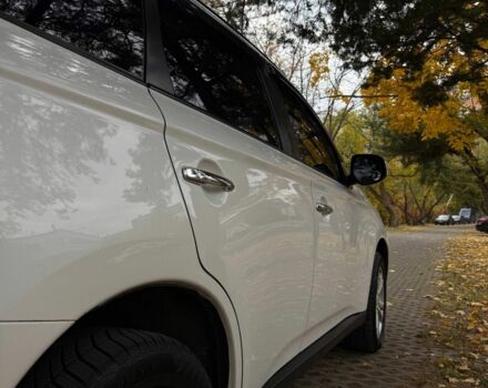 Белый Мицубиси Аутлендер, объемом двигателя 2.4 л и пробегом 146 тыс. км за 13500 $, фото 3 на Automoto.ua