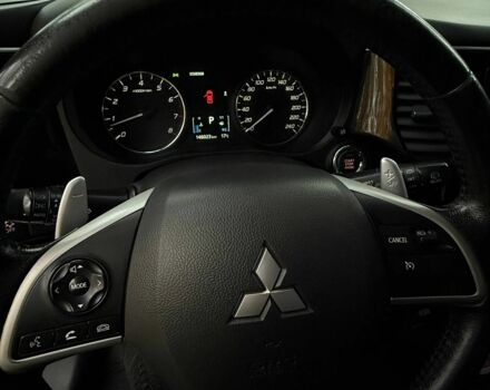 Белый Мицубиси Аутлендер, объемом двигателя 2.4 л и пробегом 146 тыс. км за 13500 $, фото 10 на Automoto.ua