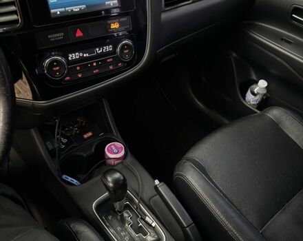 Белый Мицубиси Аутлендер, объемом двигателя 2.4 л и пробегом 146 тыс. км за 13500 $, фото 11 на Automoto.ua