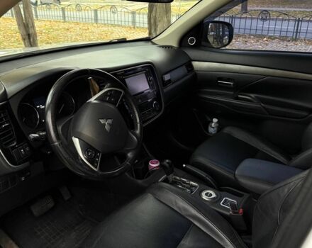 Белый Мицубиси Аутлендер, объемом двигателя 2.4 л и пробегом 146 тыс. км за 13500 $, фото 13 на Automoto.ua