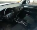 Білий Міцубісі Аутлендер, об'ємом двигуна 2.4 л та пробігом 158 тис. км за 15000 $, фото 4 на Automoto.ua