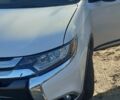 Білий Міцубісі Аутлендер, об'ємом двигуна 2.4 л та пробігом 158 тис. км за 15000 $, фото 7 на Automoto.ua