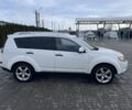 Белый Мицубиси Аутлендер, объемом двигателя 2 л и пробегом 270 тыс. км за 4700 $, фото 3 на Automoto.ua