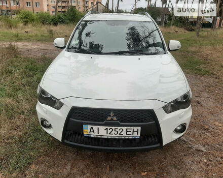 Белый Мицубиси Аутлендер, объемом двигателя 2.4 л и пробегом 63 тыс. км за 13800 $, фото 4 на Automoto.ua