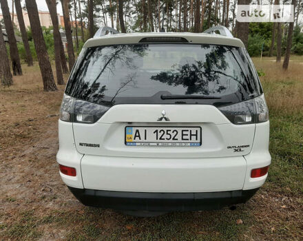 Белый Мицубиси Аутлендер, объемом двигателя 2.4 л и пробегом 63 тыс. км за 13800 $, фото 1 на Automoto.ua