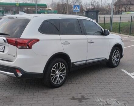 Белый Мицубиси Аутлендер, объемом двигателя 2.4 л и пробегом 119 тыс. км за 17800 $, фото 4 на Automoto.ua