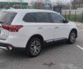 Белый Мицубиси Аутлендер, объемом двигателя 2.4 л и пробегом 119 тыс. км за 17800 $, фото 4 на Automoto.ua