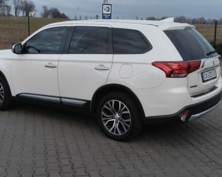 Белый Мицубиси Аутлендер, объемом двигателя 2.4 л и пробегом 119 тыс. км за 17800 $, фото 3 на Automoto.ua