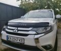 Білий Міцубісі Аутлендер, об'ємом двигуна 2.4 л та пробігом 193 тис. км за 13745 $, фото 1 на Automoto.ua