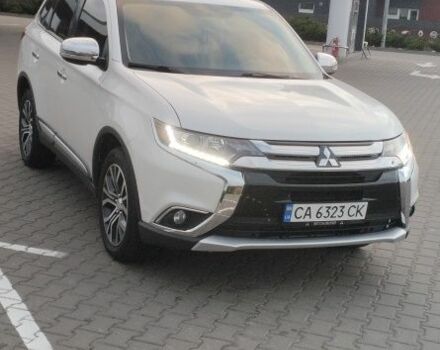 Белый Мицубиси Аутлендер, объемом двигателя 2.4 л и пробегом 119 тыс. км за 17800 $, фото 2 на Automoto.ua