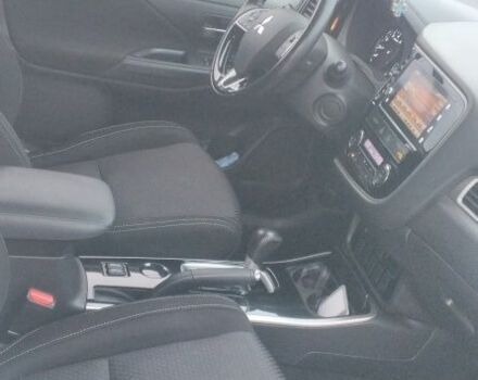 Белый Мицубиси Аутлендер, объемом двигателя 2.4 л и пробегом 119 тыс. км за 17800 $, фото 1 на Automoto.ua